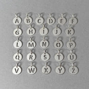 By Wue sterling silver initial charms, A to Z