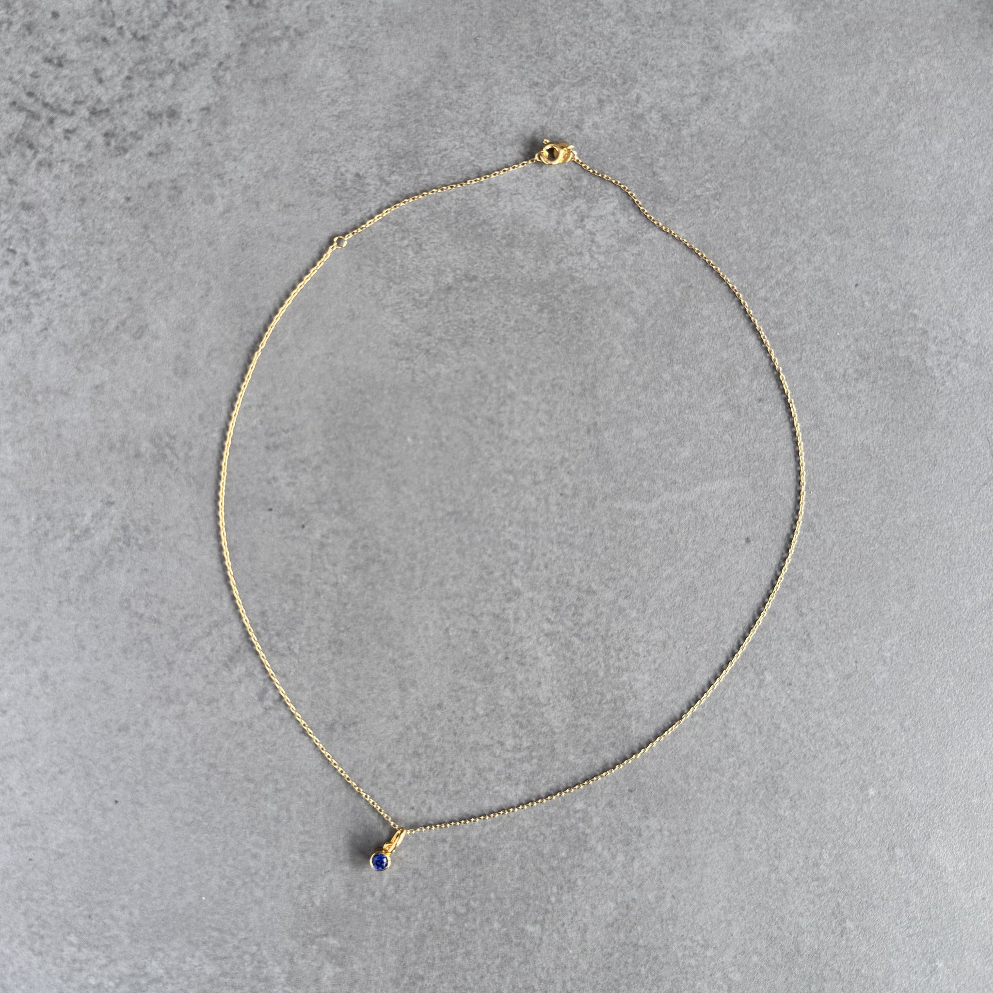 September sapphire birthstone necklace in sterling silver by By Wue