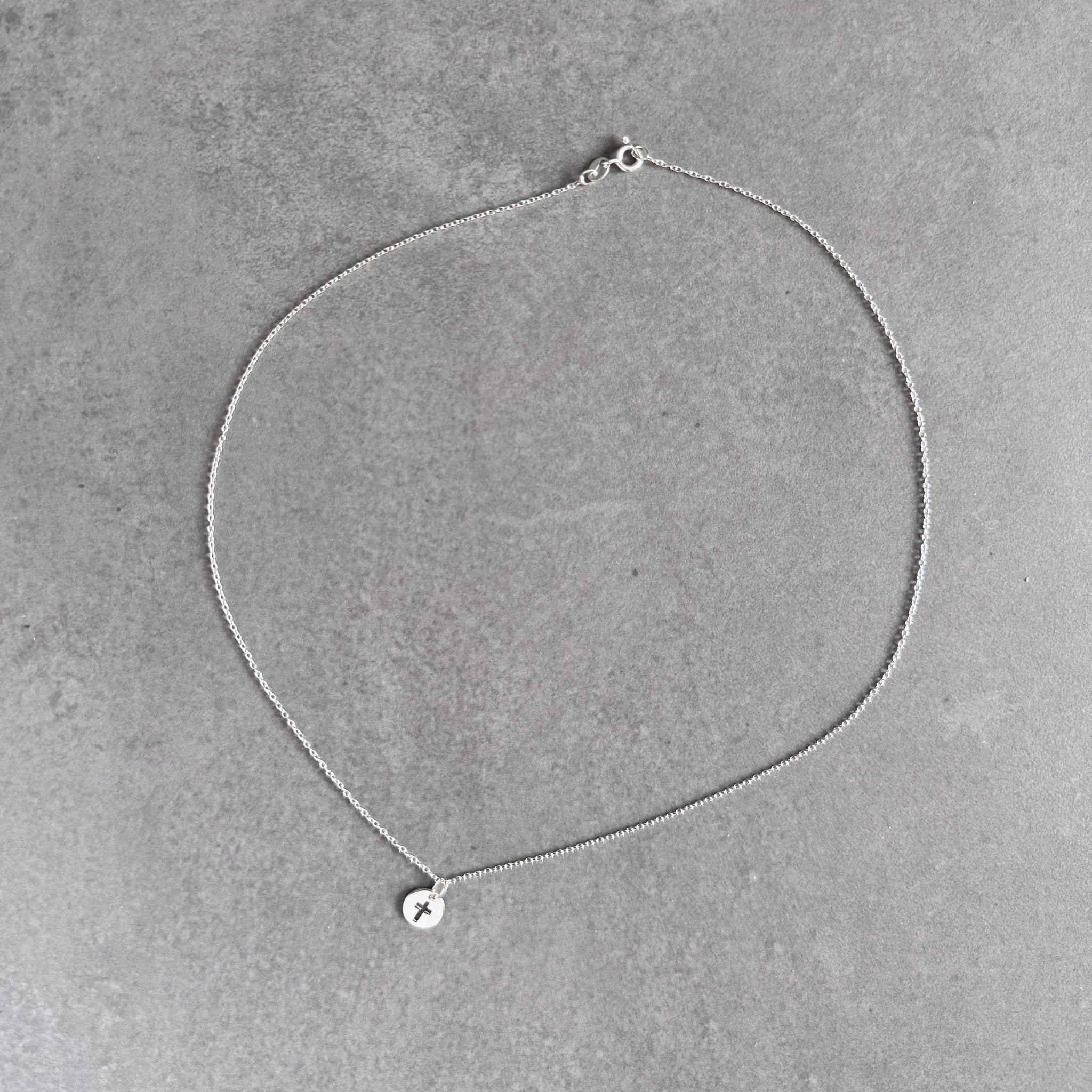 Cross pendant necklace in sterling silver by By Wue