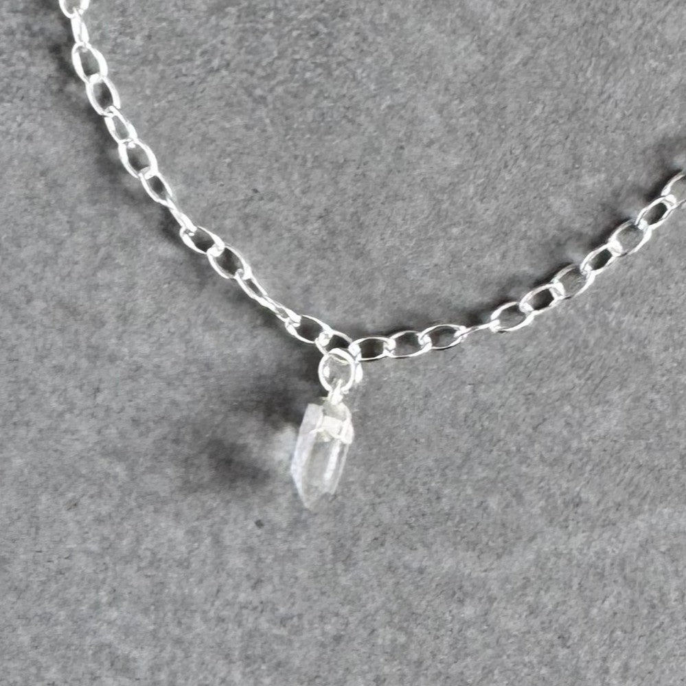Close up of the crystal charm on a By Wue bracelet