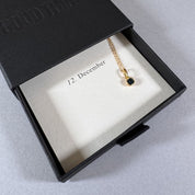 December birthstone necklace in a By Wue gift box with month card