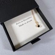 December birthstone necklace in a By Wue gift box with message card