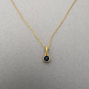 December birthstone necklace set with blue zircon, 24ct gold plated sterling silver