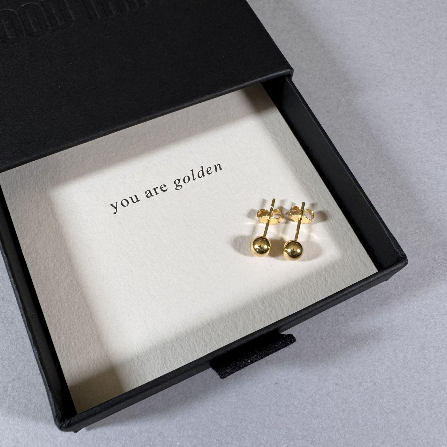 Gold Ball Earrings in a By Wue gift box