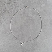 Initial necklace in sterling silver by By Wue