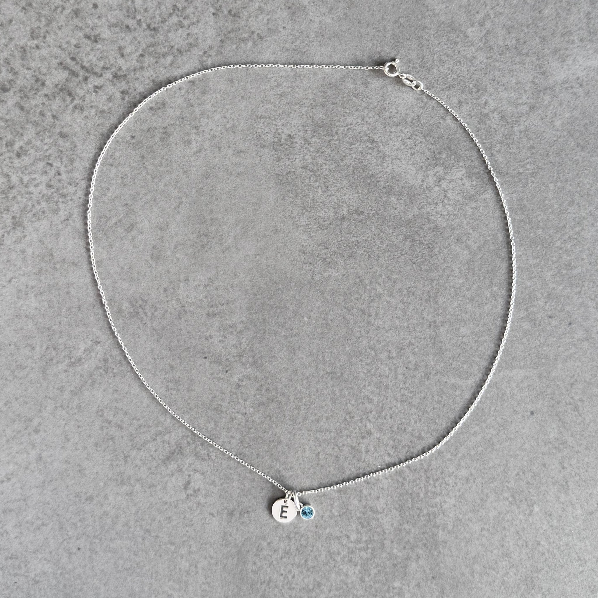 Initial necklace with birthstone in sterling silver by By Wue