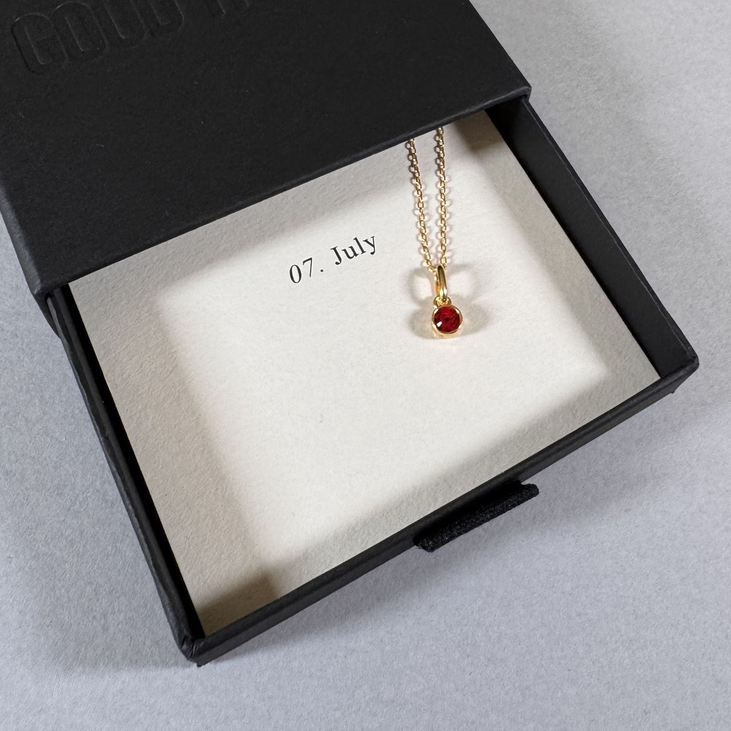 July birthstone necklace in a By Wue gift box with month card