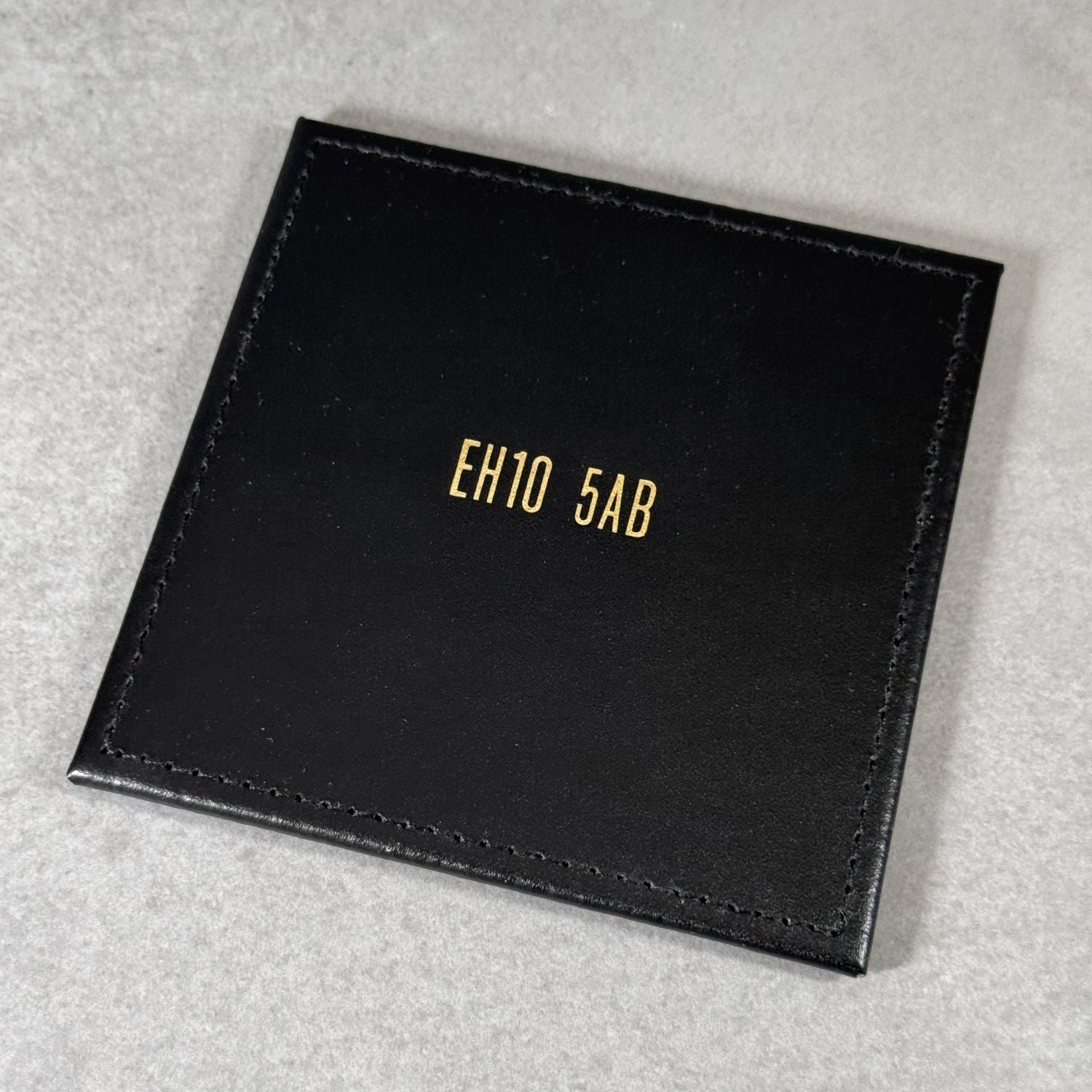Postcode Coaster in leather