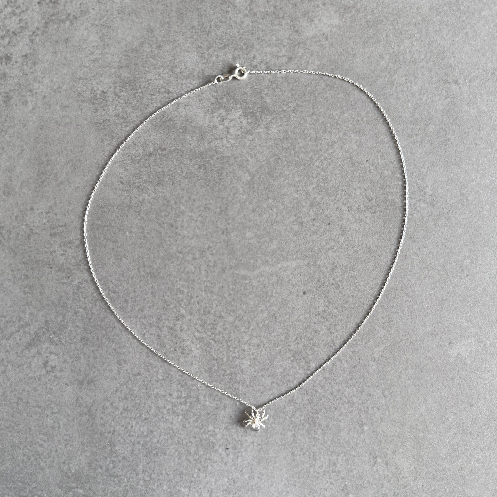 Spider pendant necklace in sterling silver by By Wue